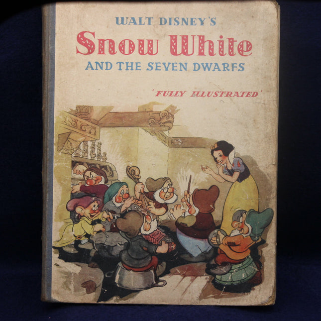 Vintage book cover of 'Snow White and the Seven Dwarfs' by Walt Disney