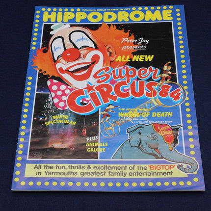 Hippodrome Super Circus 84 promotional poster with clown and circus elements on a dark background