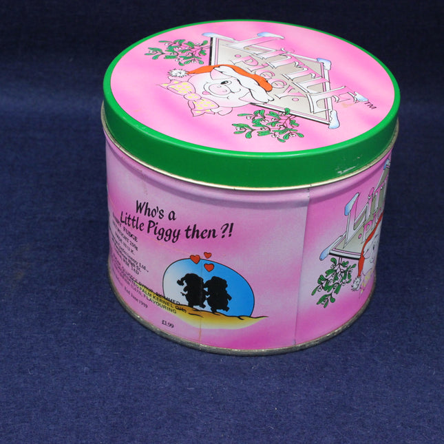 Pink tin with cartoon design on a blue background
