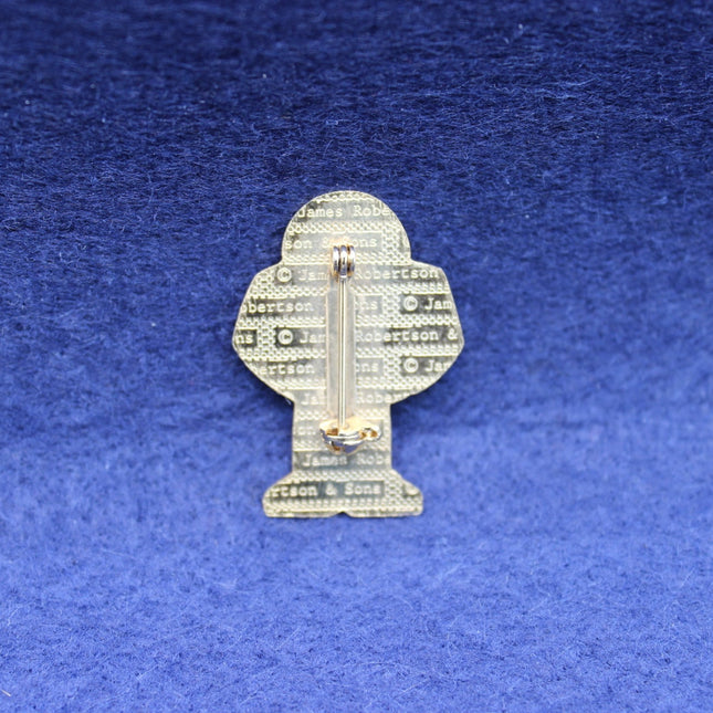 Rear view of a 1990s Robertson’s “American Footballer” Golly Badge with backstamp