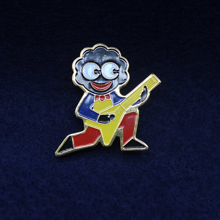 1998 Robertson’s Golly Guitarist Badge on dark felt