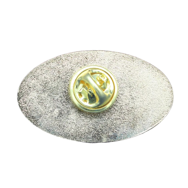 Metallic oval badge with a central emblem on a blue textured background