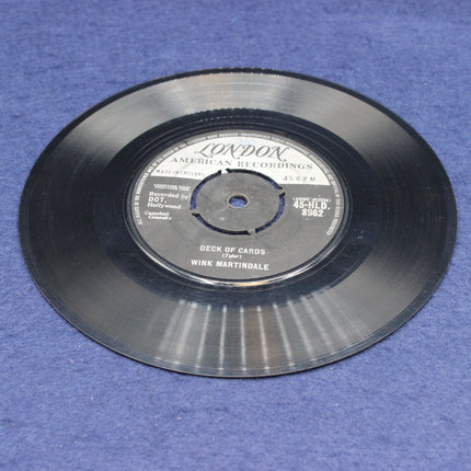 Vinyl record with 'London American Recordings' label on a blue background