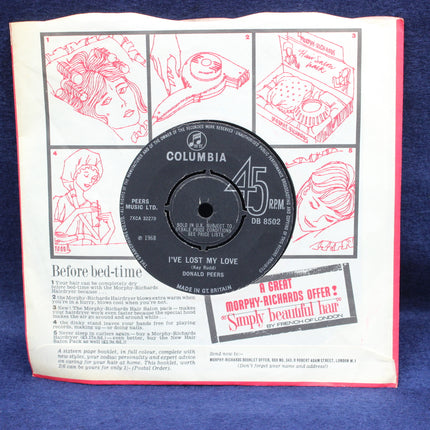 Record label from a vinyl record with red illustrations on a blue background