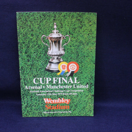 Programme cover for Arsenal v Manchester United FA Cup Final at Wembley Stadium on a green grass background