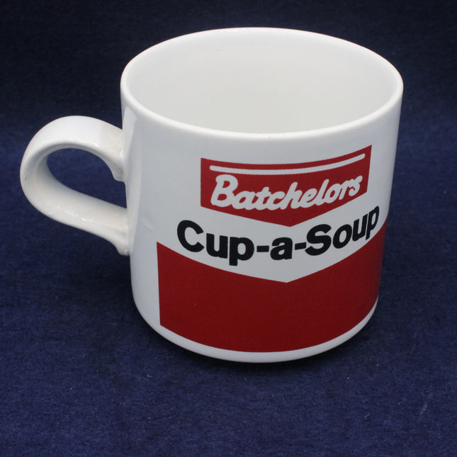 White mug with Batchelors Cup-a-Soup logo on a dark blue background