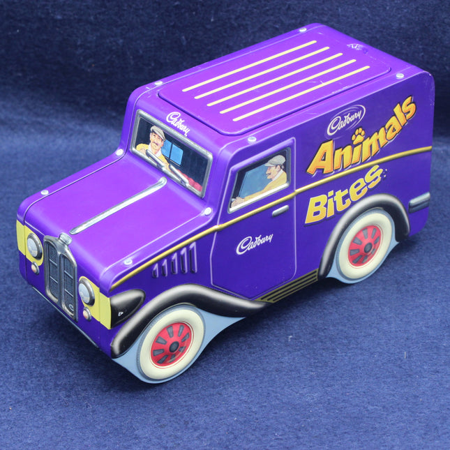 Purple truck-shaped container with 'Cadbury Animals Bites' branding on a blue background