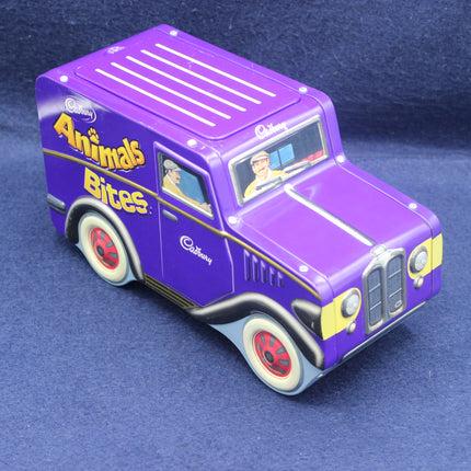 Purple toy truck with 'Cadbury Animals Bites' branding on a blue background