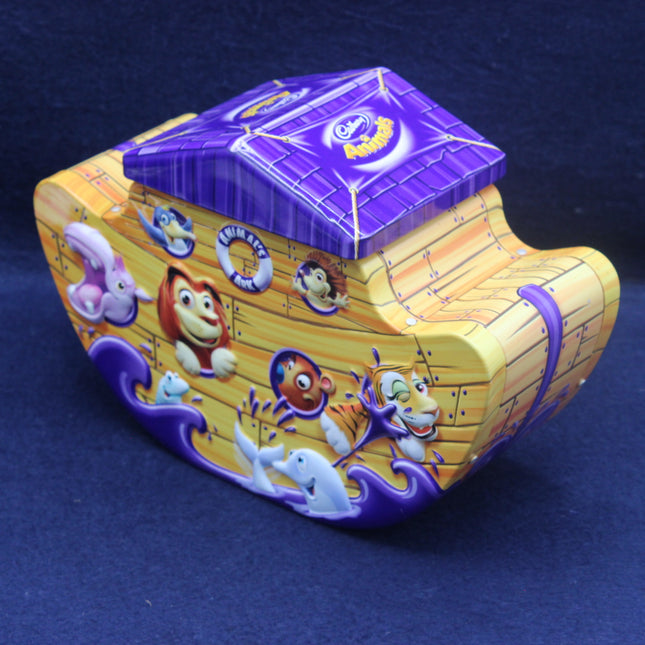 Colorful toy box with cartoon characters on a dark blue background