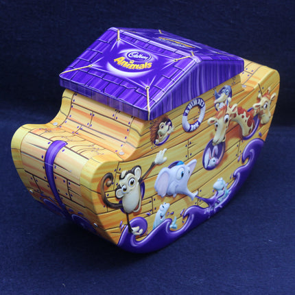 Cadbury Animolds chocolate box with cartoon characters on a dark blue background