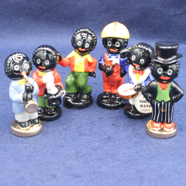 A complete limited edition Series Three collection of Carlton Ware Golly figurines