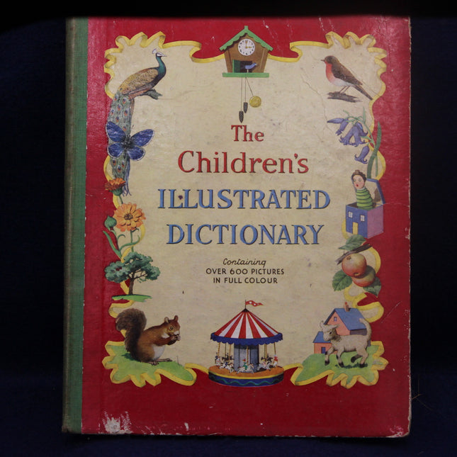 Children's Illustrated Dictionary book cover with colorful illustrations on a red background