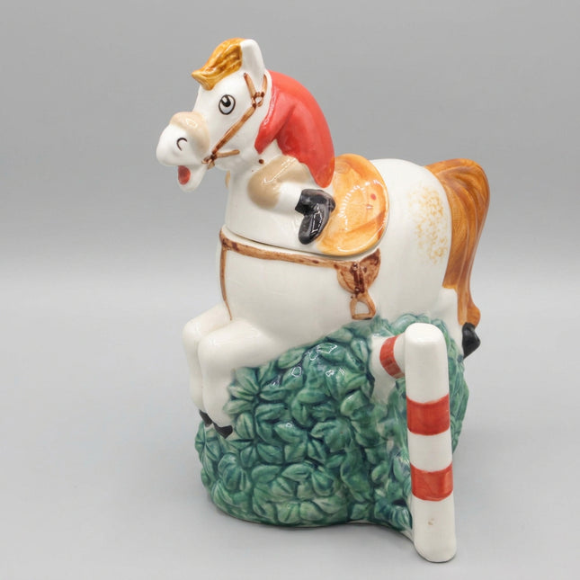 Decorative horse figurine on a blue background