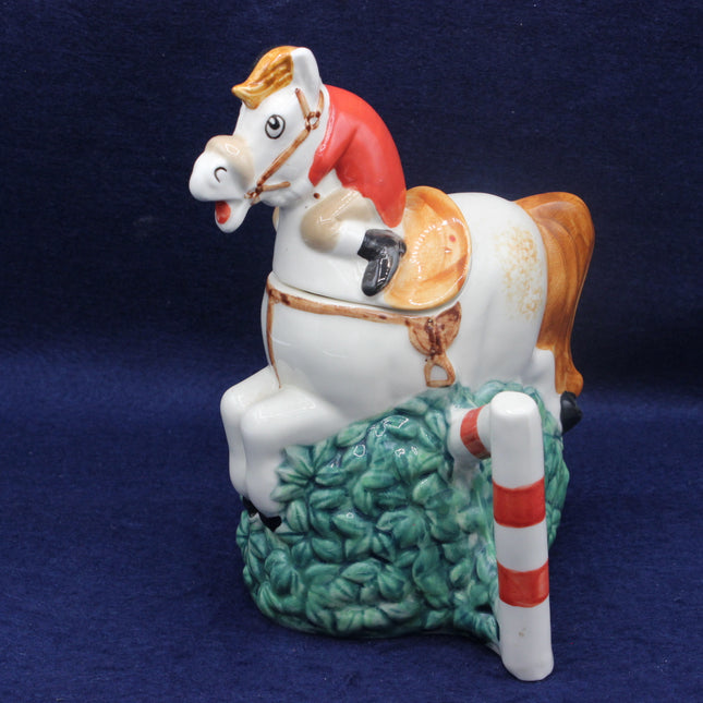 Decorative horse figurine on a blue background