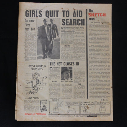 Vintage newspaper page with black and white photos and text on a dark background