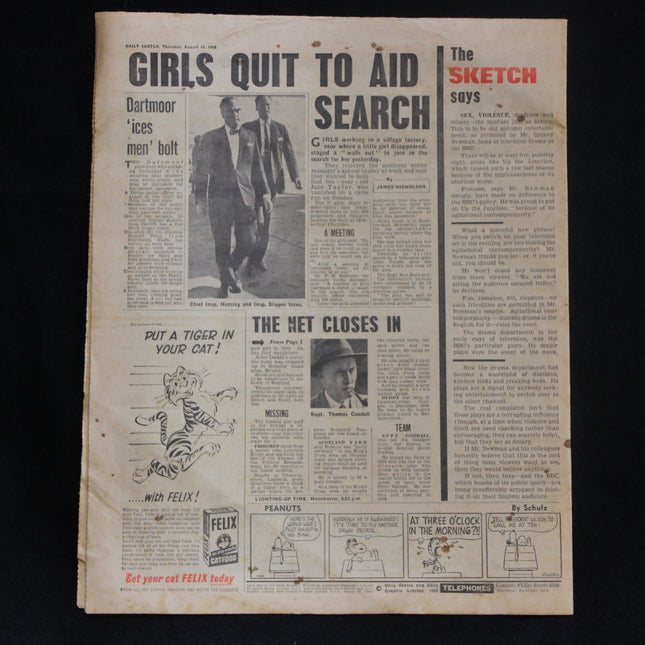 Vintage newspaper page with black and white photos and text on a dark background