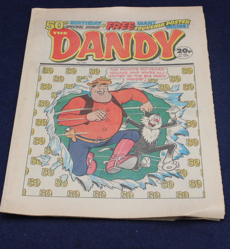 Vintage comic book 'The Dandy' with a character on the cover against a blue background