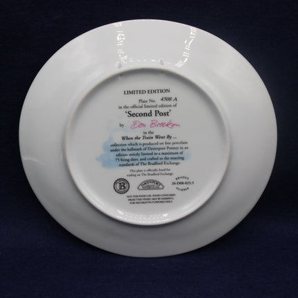 White plate with text and branding on a dark background