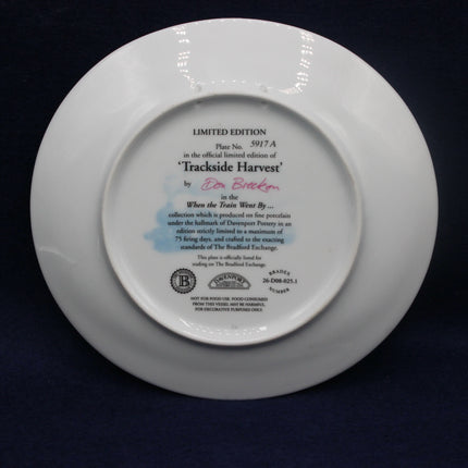 White plate with text and branding on a dark background