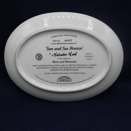 White plate with engraved text on a black background