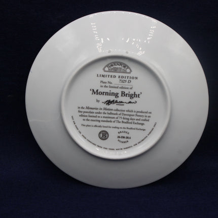 White plate with engraved text on a dark background
