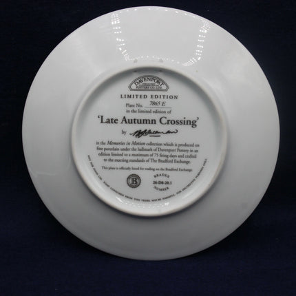 White plate with text and branding on a dark background