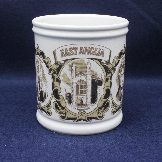 White mug with 'East Anglia' and architectural design on a blue background