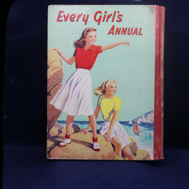 Book titled 'Every Girl's Annual' with illustration of two girls on a beach cover