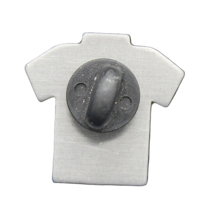 Small gray shirt-shaped object with a central button on a blue fabric background