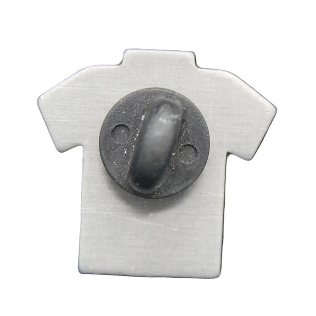 Small gray shirt-shaped object with a central button on a blue fabric background