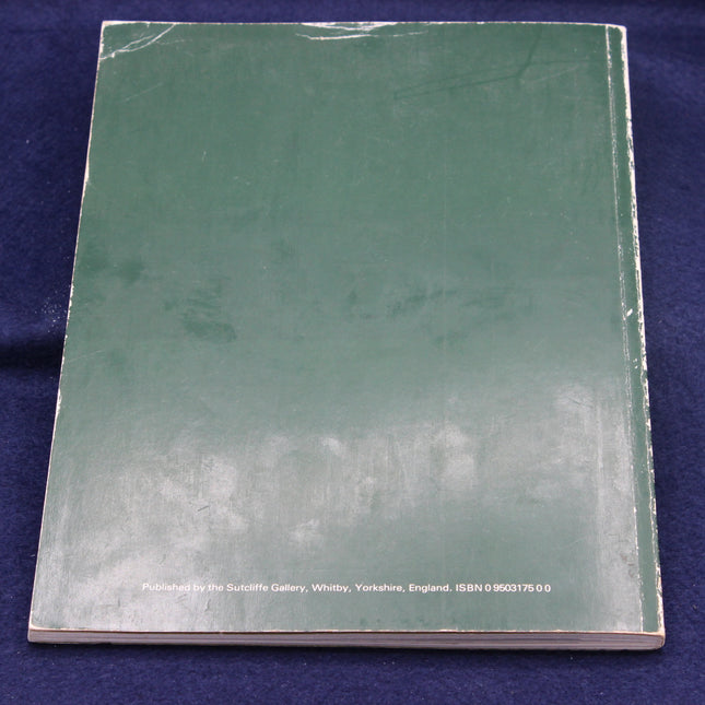 Green book with text on a blue background