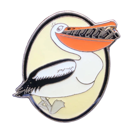 Gilroy Guinness Badge 1997 – Pelican with Guinness Bottles on a white background