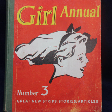 Vintage book cover titled 'Girl Annual Number 3' with a stylized illustration of a girl's profile on a red background.