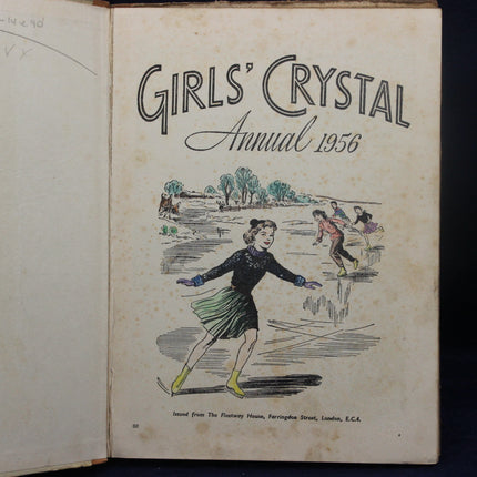 Vintage 'Girls' Crystal Annual 1956' book with illustration of girls skating.