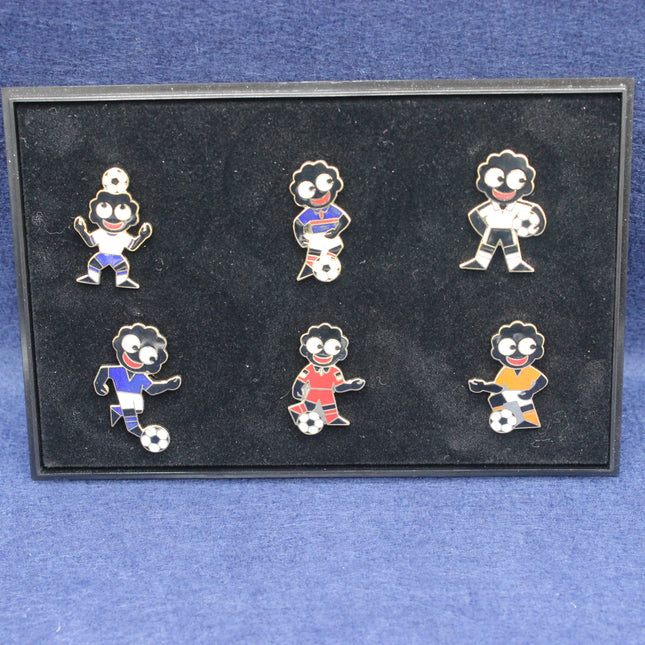 Set of six Football  Euro 2000 Golly pins on a black card against a blue background