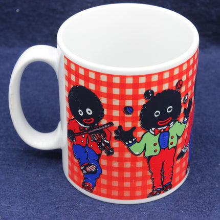 Mug with Golliwog characters on a red checkered background