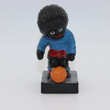 Robertsons Golly Footballer Figurine Number 3 on a hollow black pedastal.