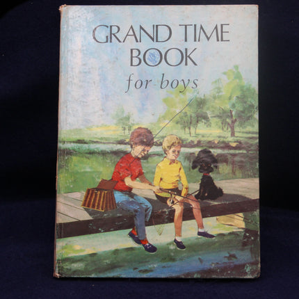Book titled 'Grand Time Book for Boys' with illustration of two boys fishing on a dock.