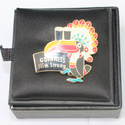 Black jewelry box with a colorful rooster design and 'Guinness Jim Strong' text on a white background.
