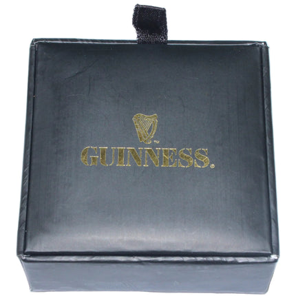 Black jewelry box with Guinness logo on a white background