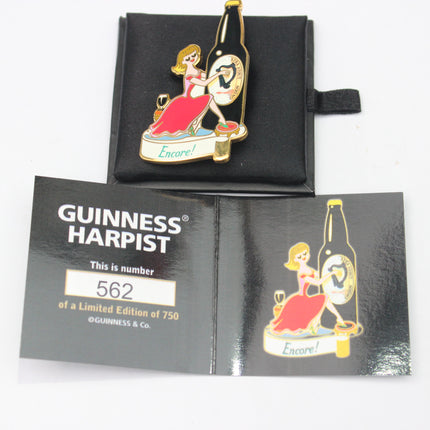 Guinness Harpist pin with packaging on a white background
