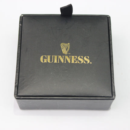 Black box with gold 'Guinness' logo on a white background