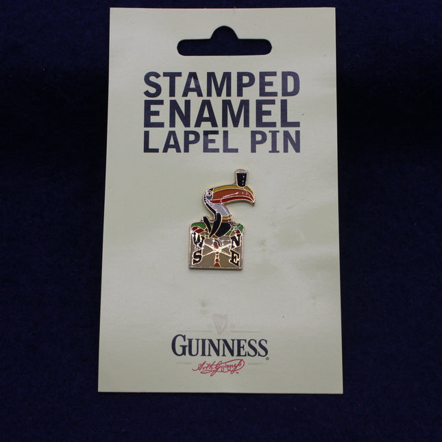 Guinness Stamped Enamel Lapel Pin on a card with Guinness branding.