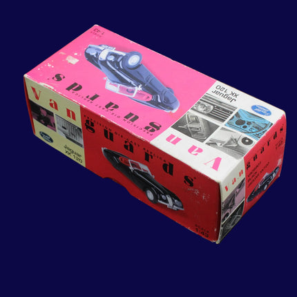 Vintage-style product packaging with a pink and red design on a dark background