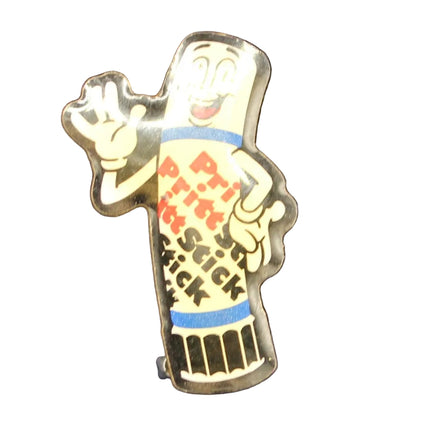 Small decorative pin on a textured blue background
