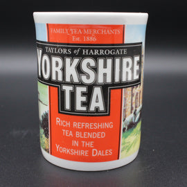 Mug with Yorkshire Tea packaging design on a dark background