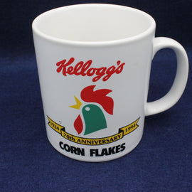 White mug with Kellogg's Corn Flakes logo on a blue background