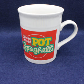 White mug with 'Golden Wonder Pot Spaghetti' logo on a blue background