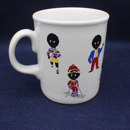 White mug with golly figures in colorful outfits on a dark blue background