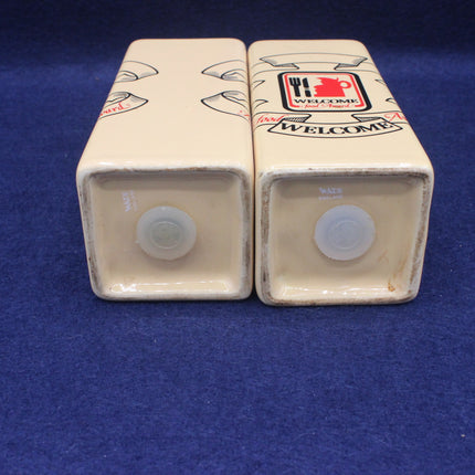 Two cream-colored containers with a 'Welcome' label on a blue background